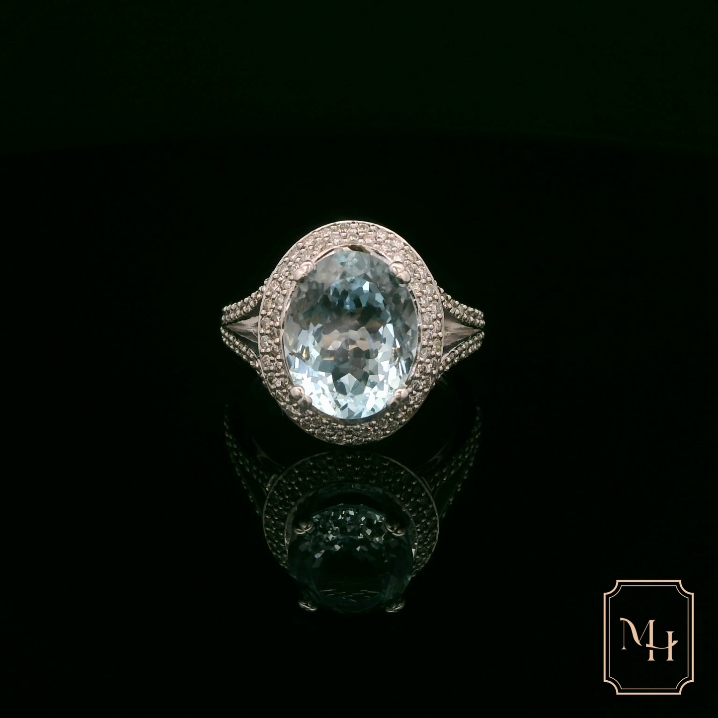 Oval-Aquamarine & Diamond Halo Ring