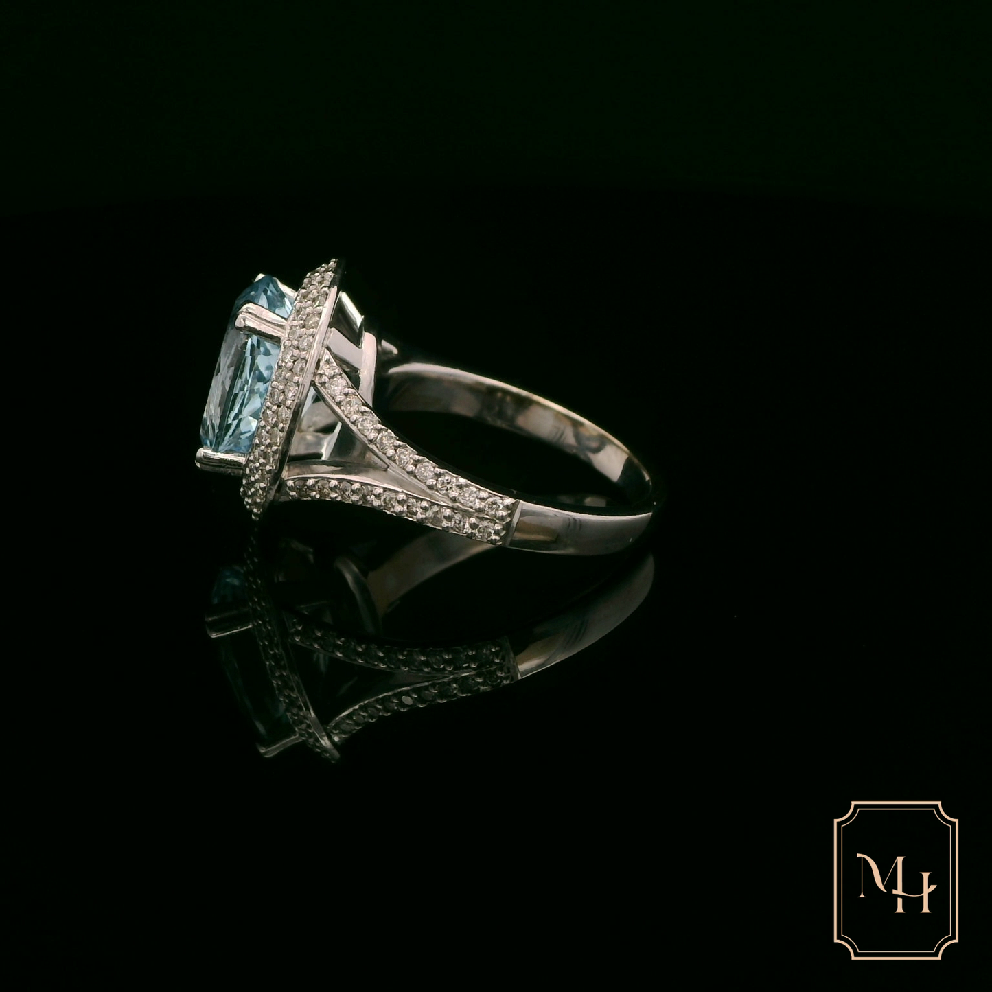 Oval-Aquamarine & Diamond Halo Ring