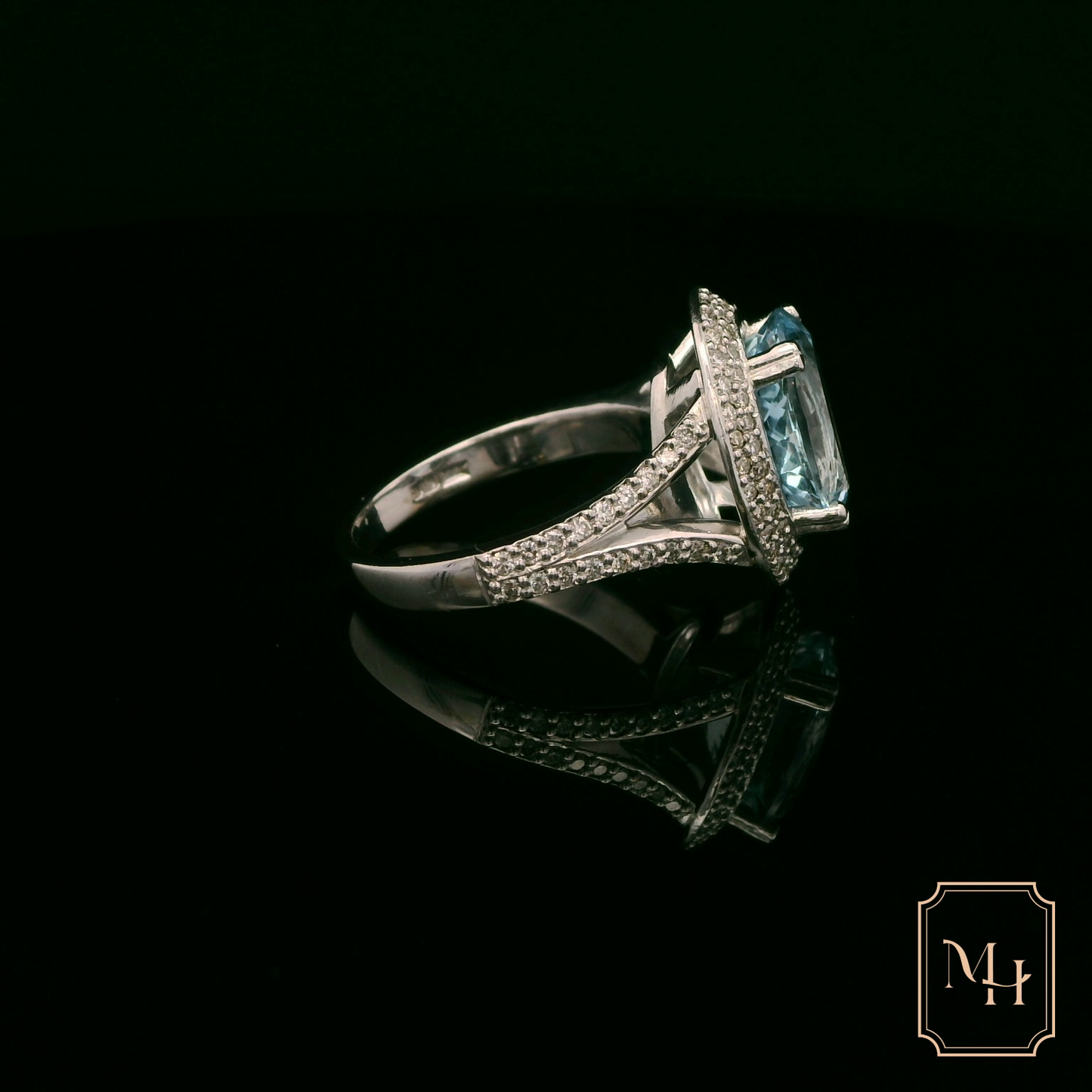 Oval-Aquamarine & Diamond Halo Ring