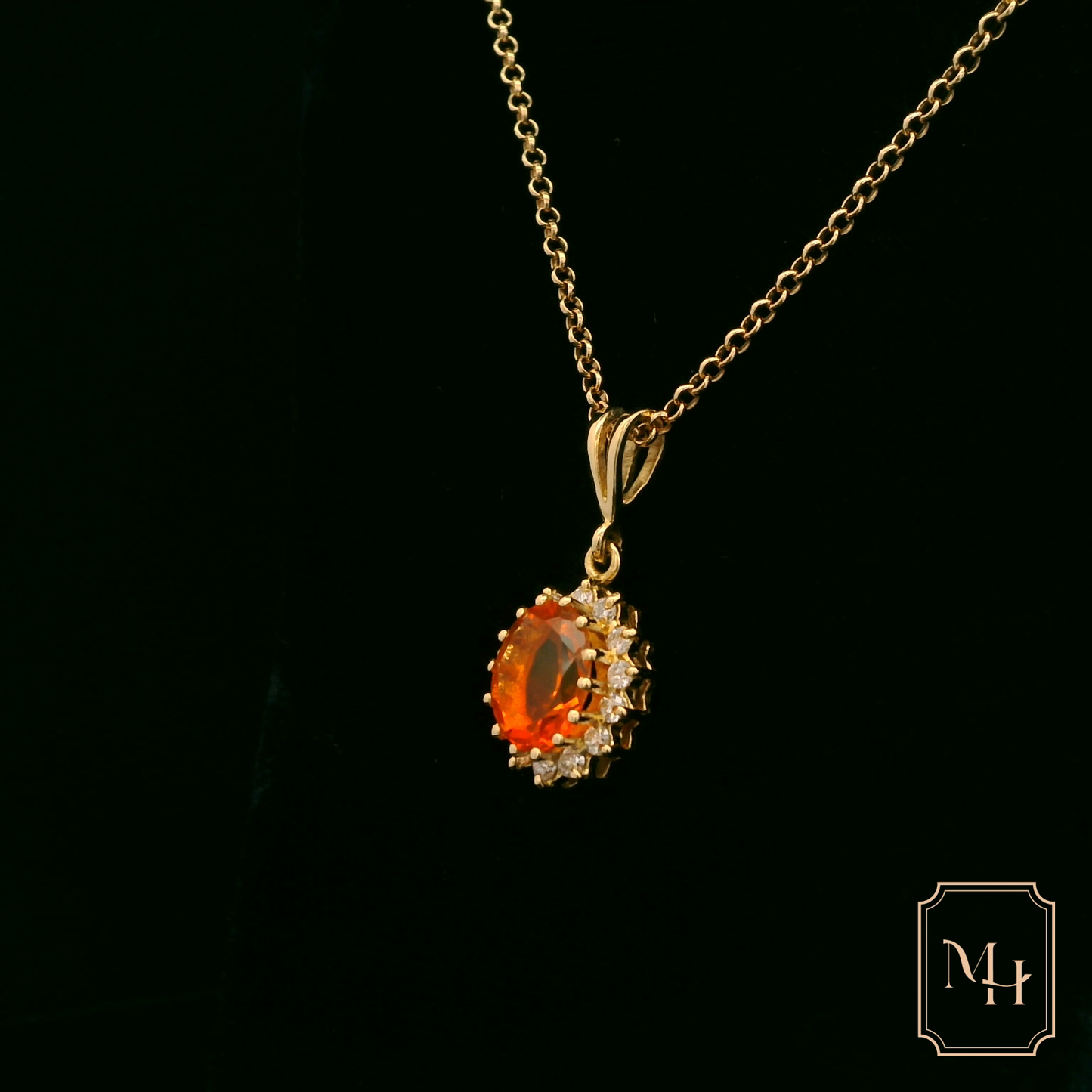 Elegant Gold Pendant with Orange Gemstone