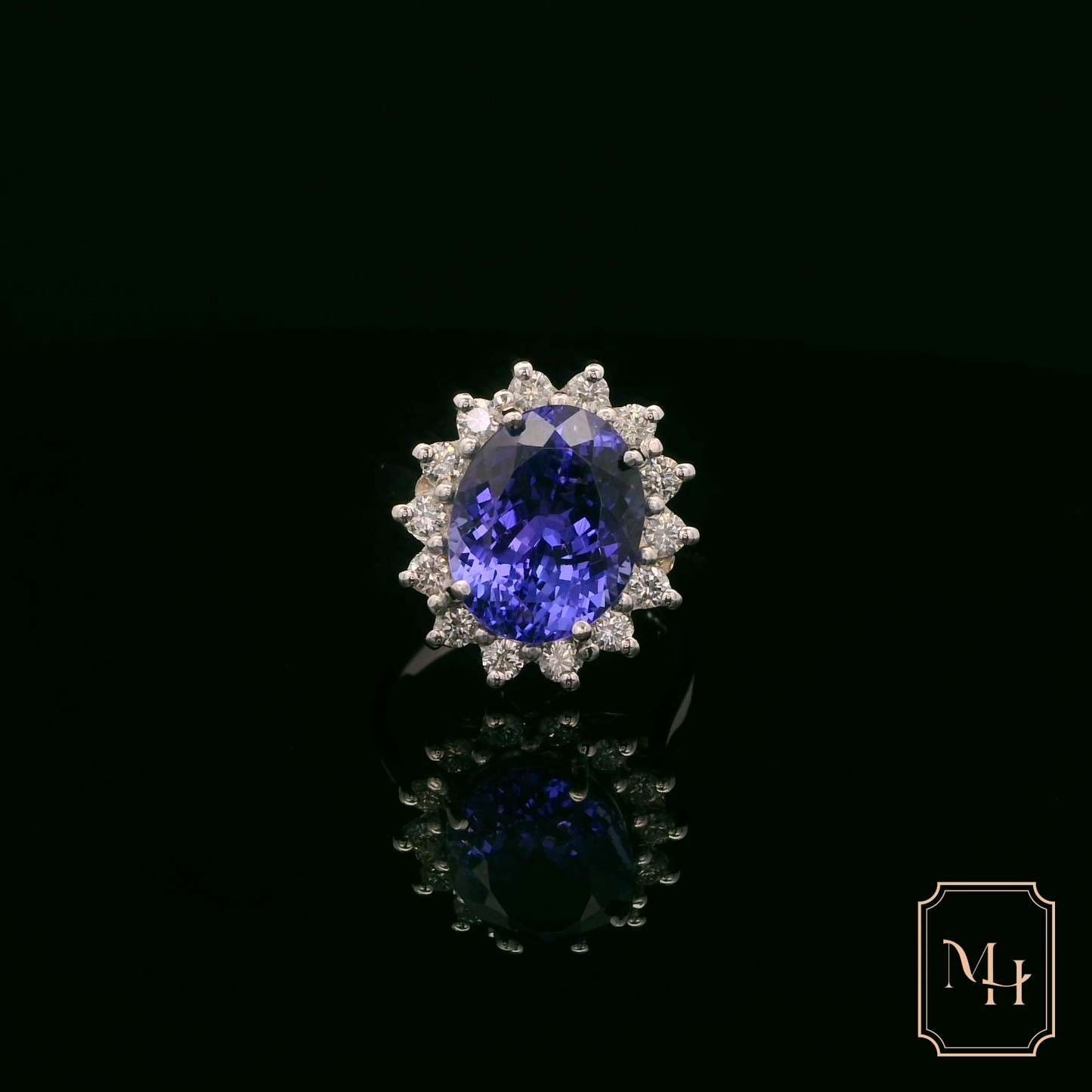 Oval Tanzanite & Diamond Cluster Ring