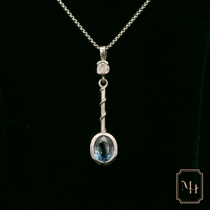 Elegant Silver Pendant with Blue Gemstone