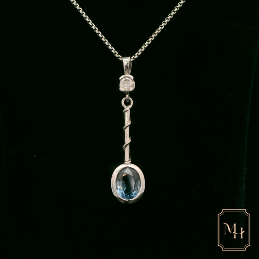 Elegant Silver Pendant with Blue Gemstone