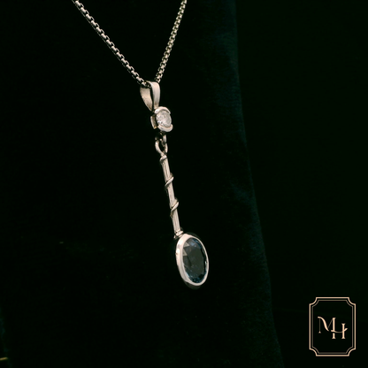 Elegant Silver Pendant with Blue Gemstone
