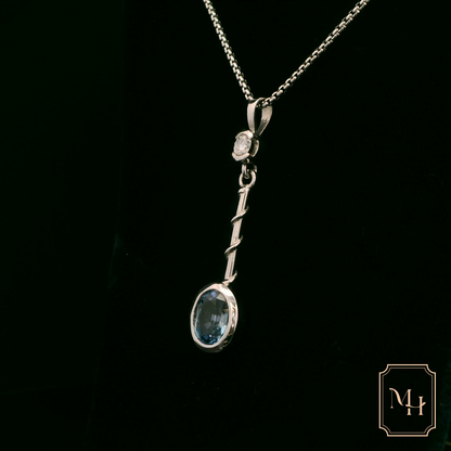 Elegant Silver Pendant with Blue Gemstone