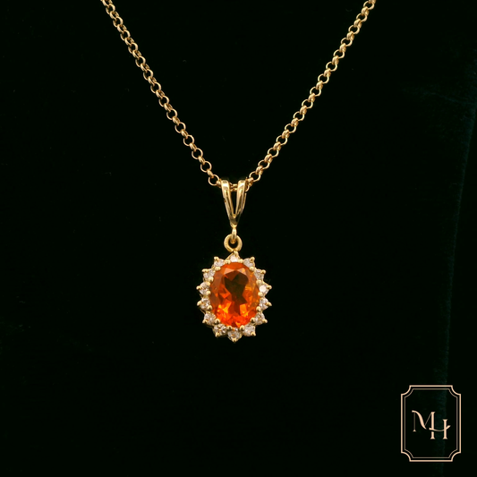 Elegant Gold Pendant with Orange Gemstone