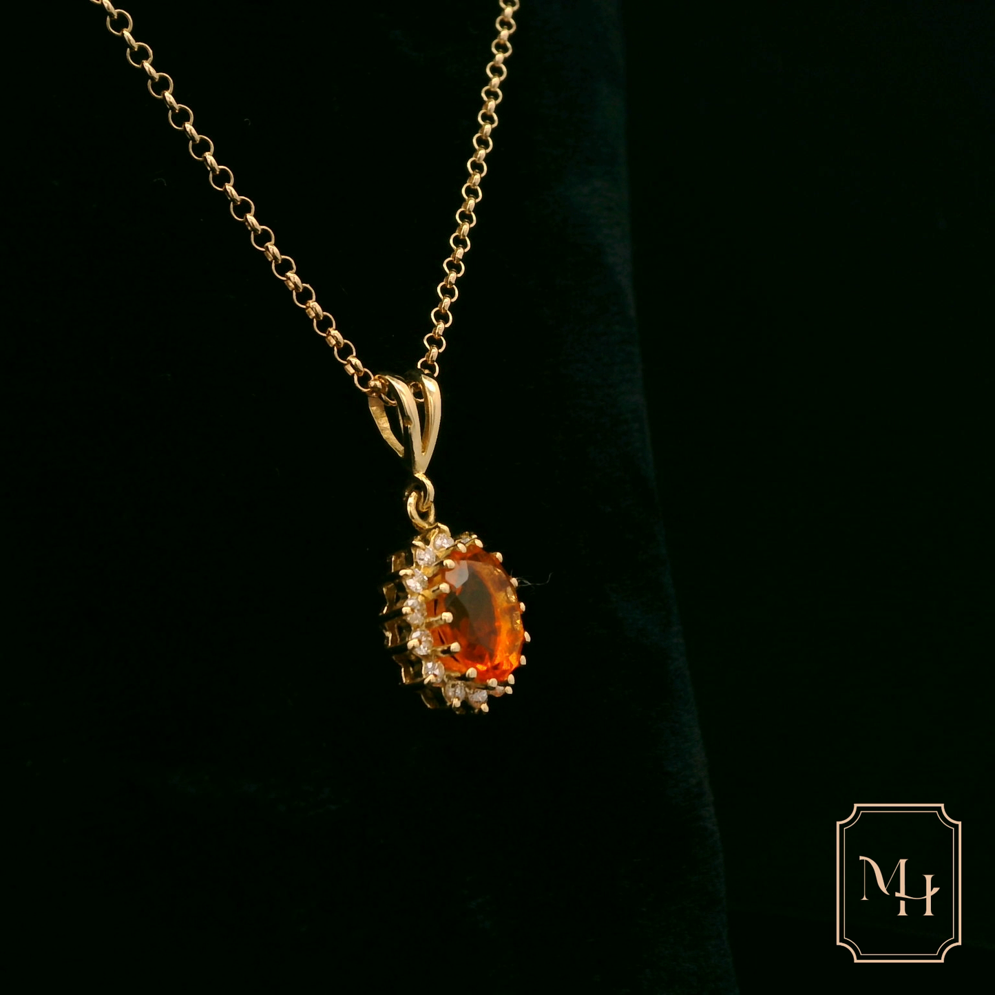 Elegant Gold Pendant with Orange Gemstone
