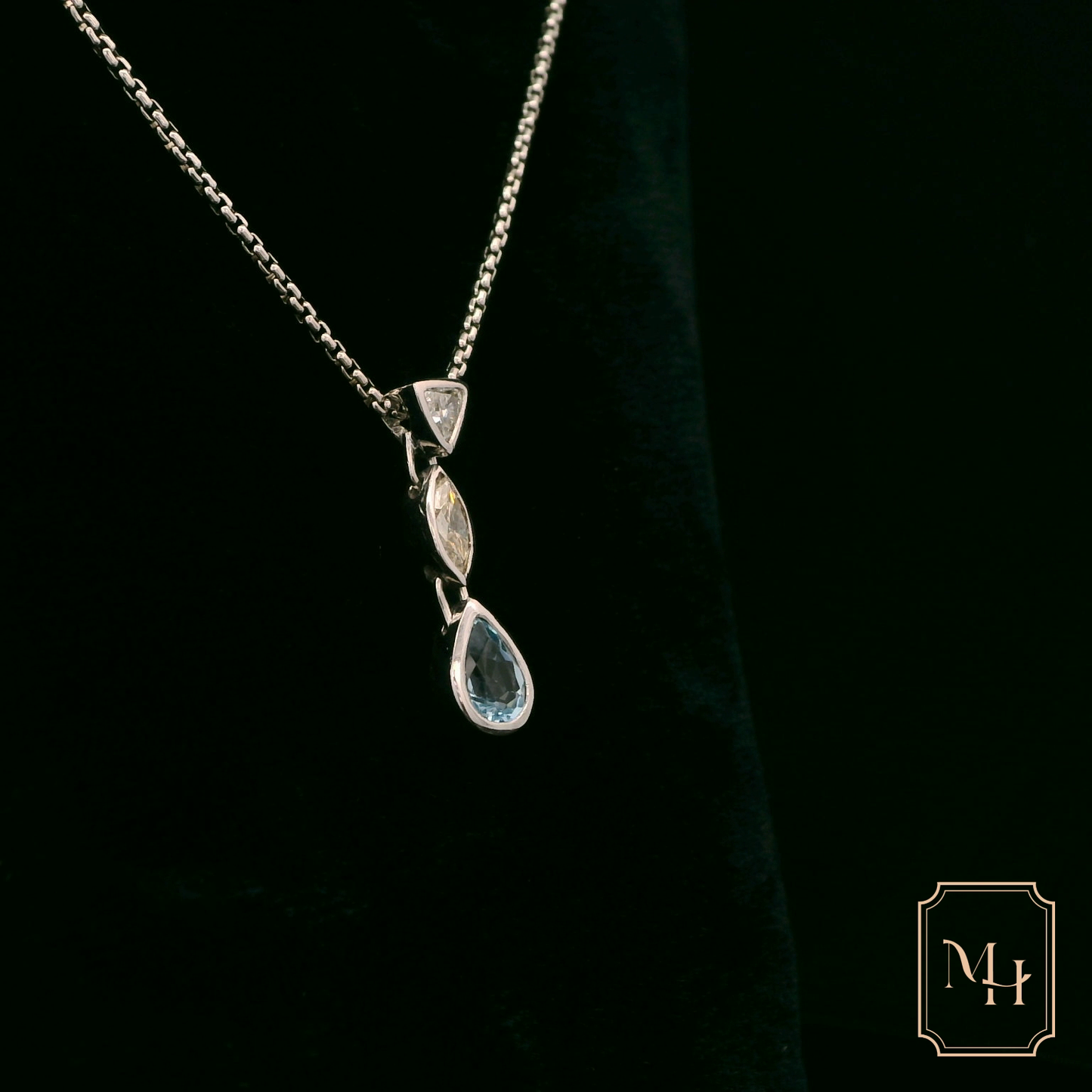 Elegant Silver Pendant with Gemstones