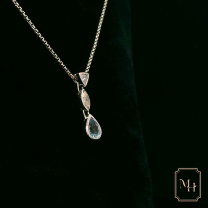 Elegant Silver Pendant with Gemstones
