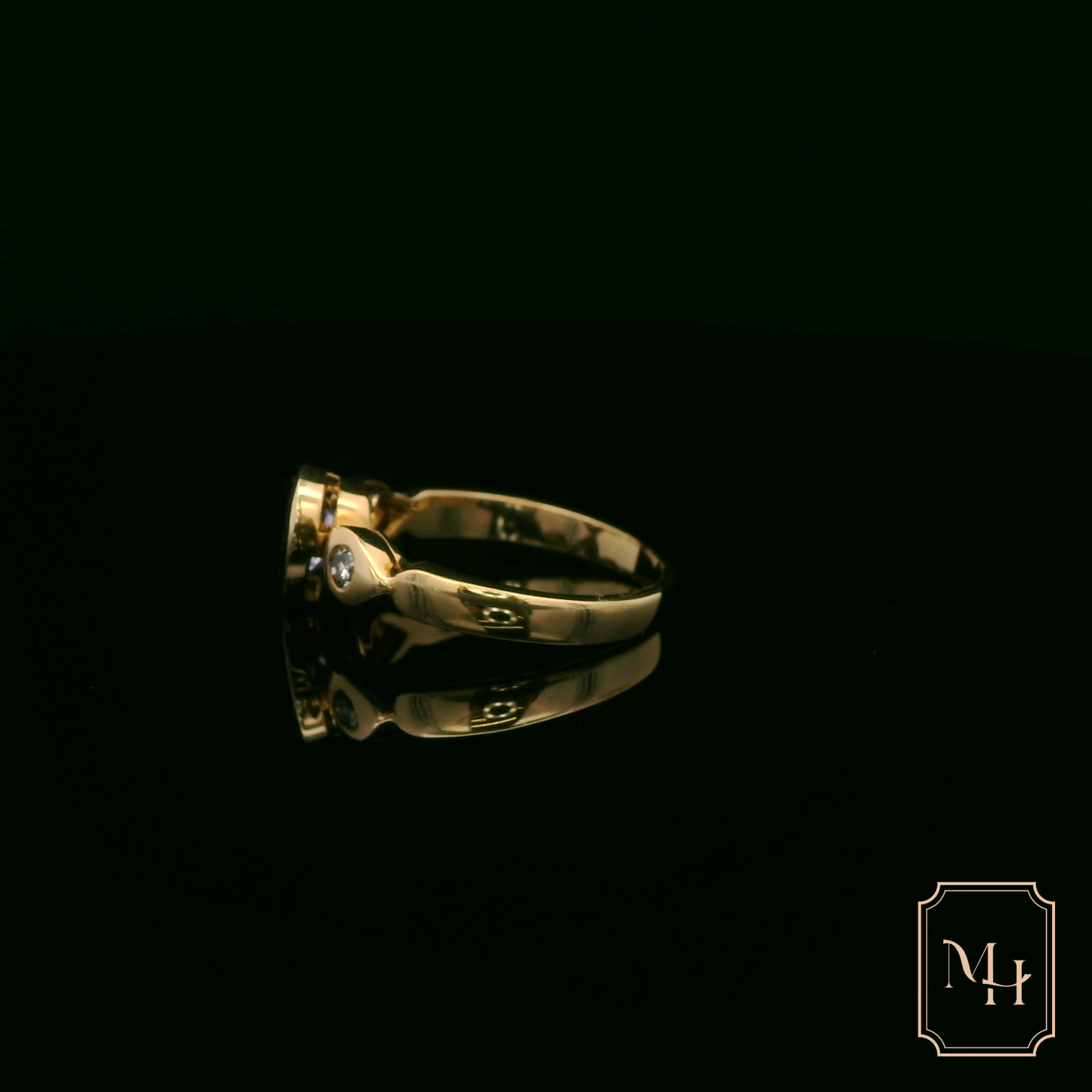 Tanzanite Pear-Shaped Diamond Ring