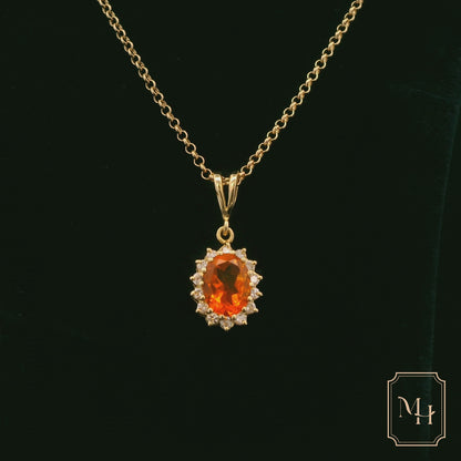 Elegant Gold Pendant with Orange Gemstone